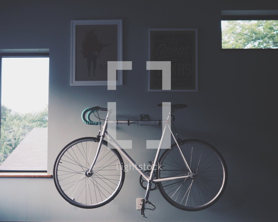 bicycle hanging on a wall 
