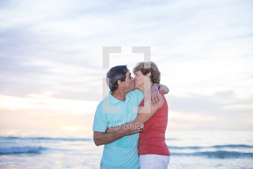 loving couple kissing on a beach 