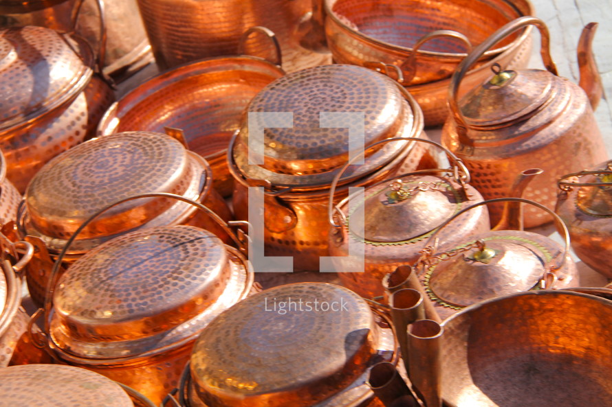 Hand made copper kettles in an Arab market