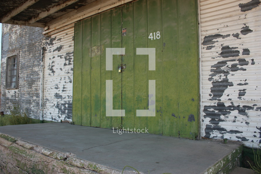 padlock on an old barn door 