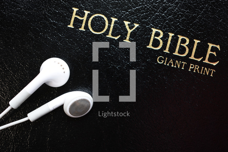 Holt Bible and earbuds 