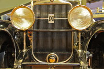 1928 V-8 Cadillac grille and headlights.