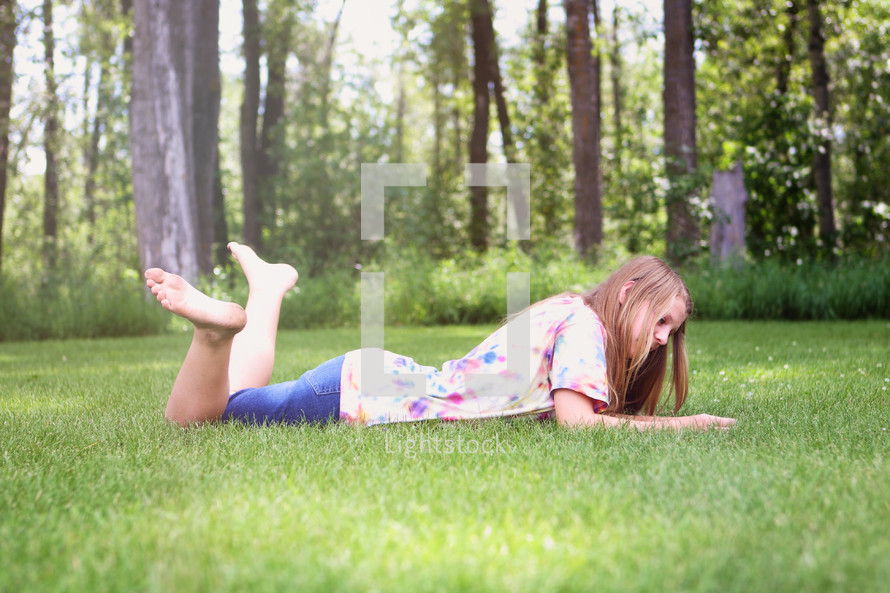 young girl in a park in the summer