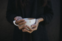 woman holding a mug 