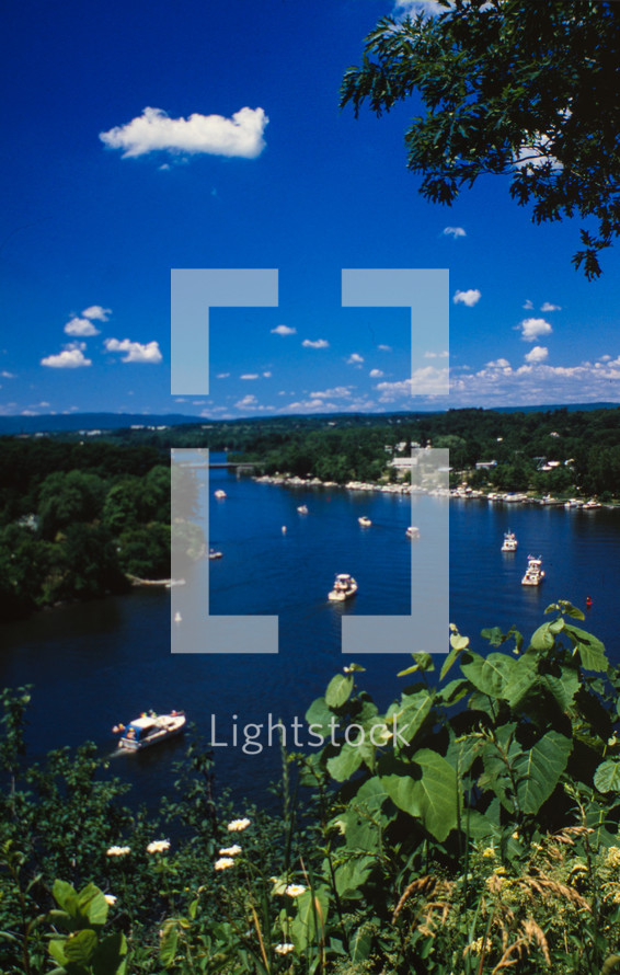 Boats on the Mohawk river, Schenectady, New York on a fair weather day