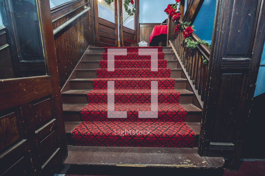 red carpet on church steps 