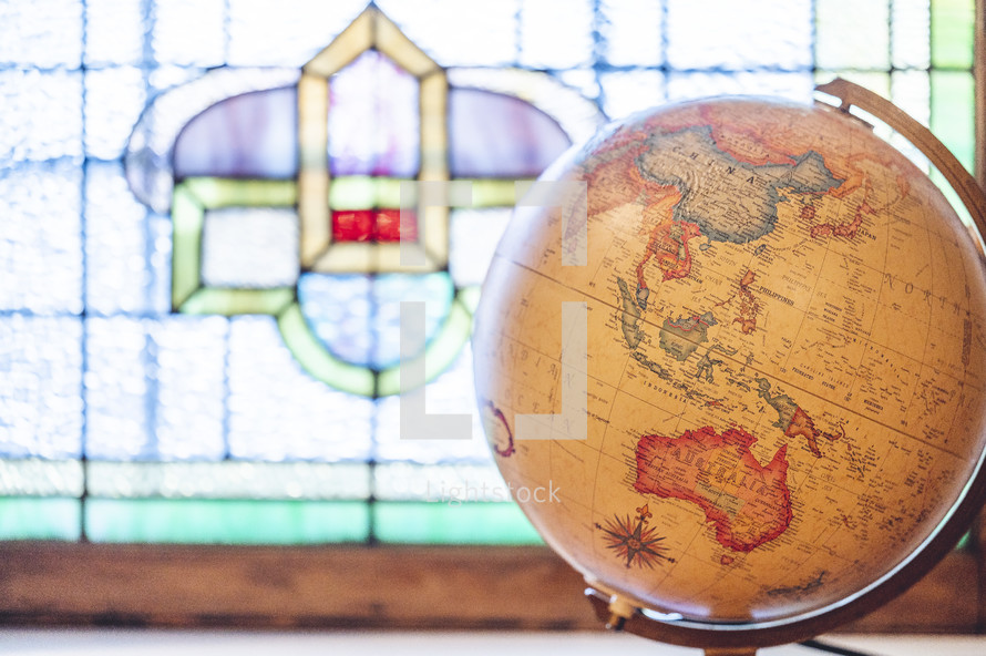 stained glass window and globe 