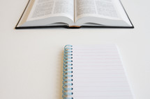 open Bible and notepad 