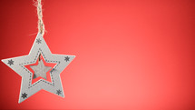 Star Christmas decoration with red background