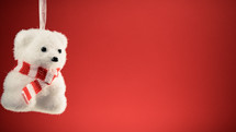 Polar bear decoration for Christmas with red background