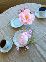 coffee cups on a tablecloth 