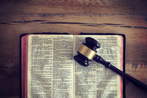 gavel on an open Bible 