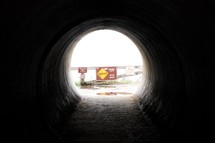 Danger sign at the end of a tunnel 