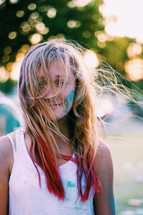 teen girl with color in her hair 