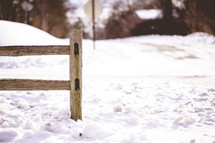 fence in snow 