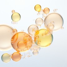 Bubbles of oil on a light background.