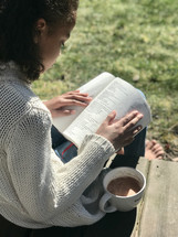 girl reading a Bible 