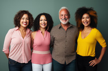Smiling multi-racial group standing together in casual clothes