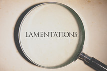 magnifying glass over Lamentations 