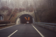 car driving through a tunnel 