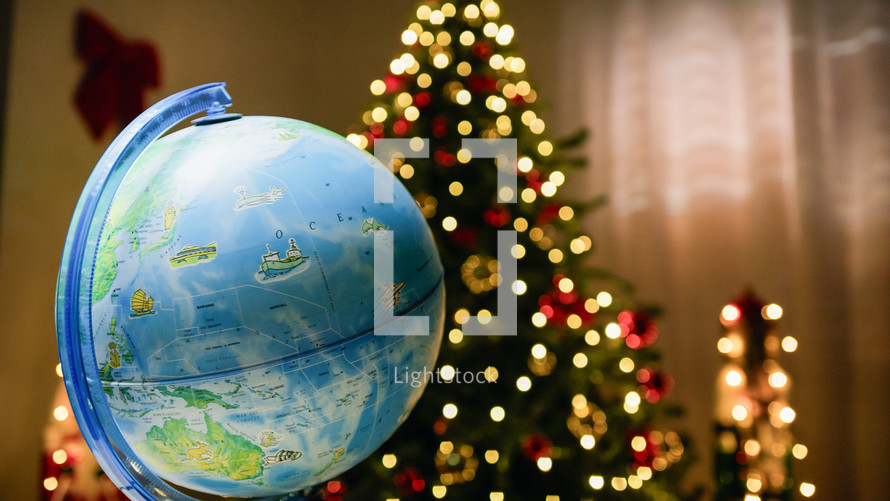 Globe showing different Countries under the tree
