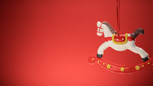 Carousel Horse decoration with red background