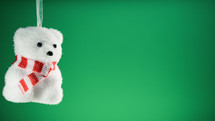 polar bear christmas decoration with green background