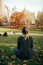 a woman relaxing in Central Park 