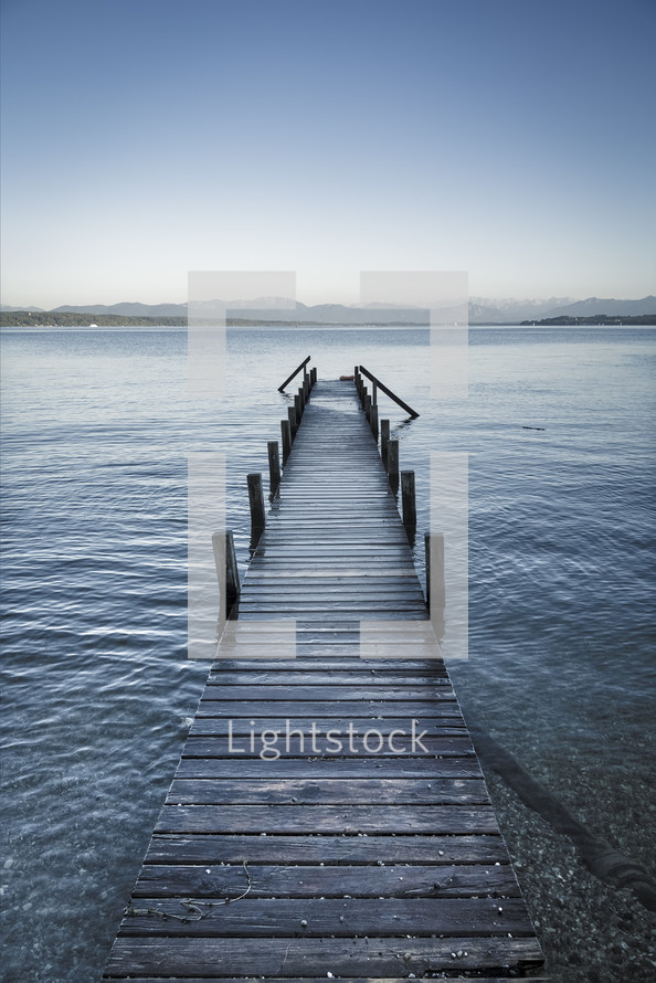 looking to the end of a pier 