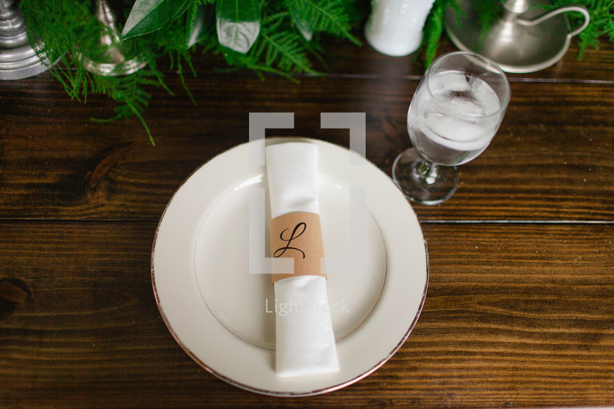 napkin ring and napkin on a plate 