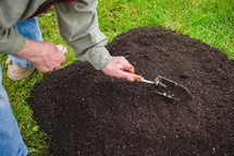 shoveling soil 