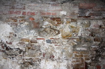 old worn and weathered brick wall 