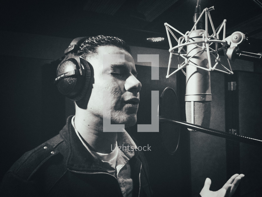 man singing in a studio 