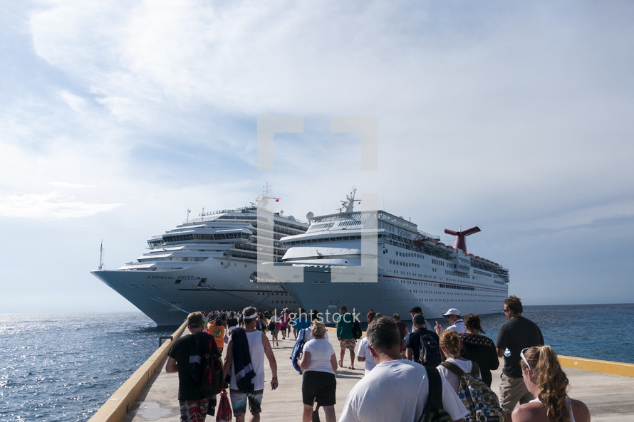 people boarding a cruise ship 