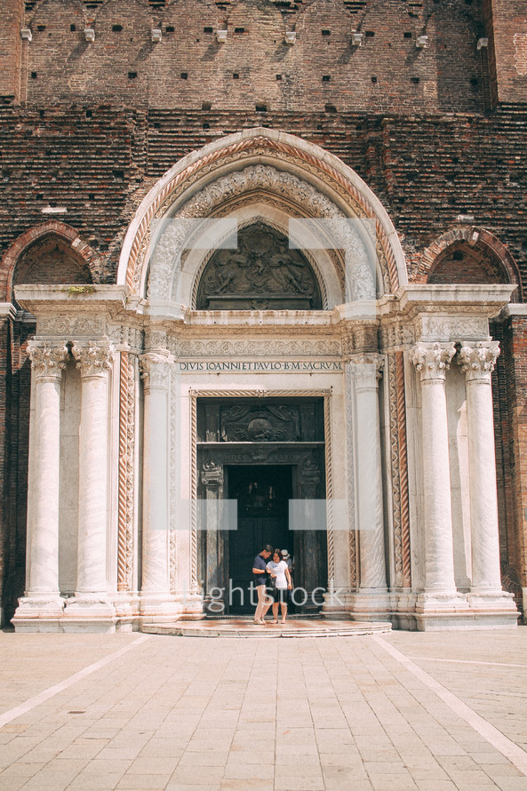 people visiting historic buildings in Venice 