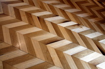 Zig zag patterned antique wooden floor   