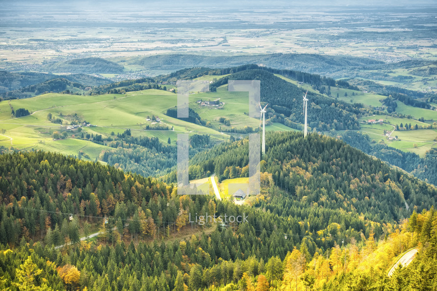 An image of two wind mill power plant in the Rhine valley area