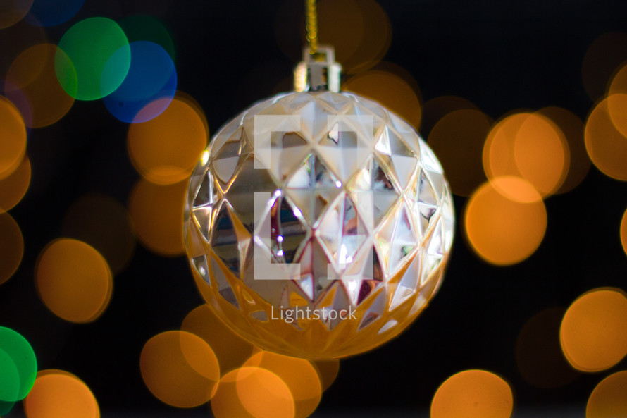 hanging ornament and bokeh Christmas lights 