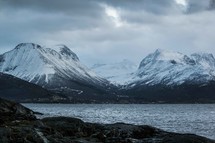 snow capped mountain peaks and inlet 