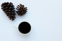 pine cones and coffee mug 