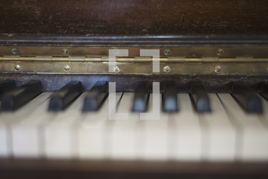 an old acoustic piano