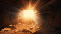 Interior of a cave with sunlight coming through the hole in the rock