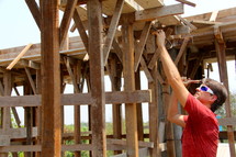 A man working on concrete framework at an orphanage in Myanmar
