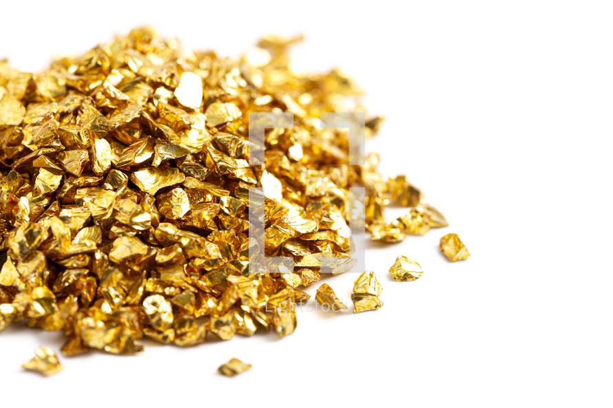pieces of Gold on a white background 