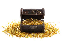 pieces of Gold in a Treasure Chest on a white background 