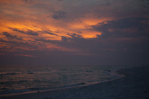 sky at sunset over a beach 