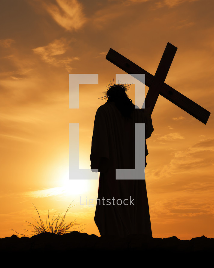 Jesus Christ with a cross in the desert at sunset. Conceptual image.