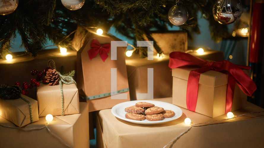 Santa Claus biscuits under Christmas tree