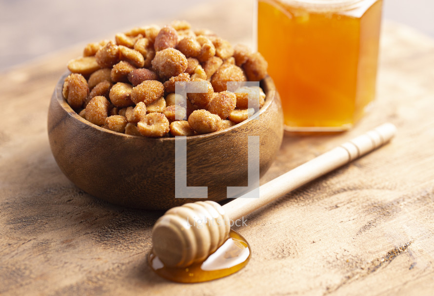 Honey Roasted Peanuts on a Dark Wooden Table