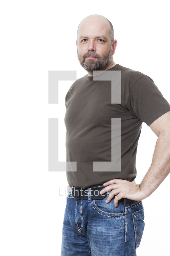 portrait of a man with hands on his hips 